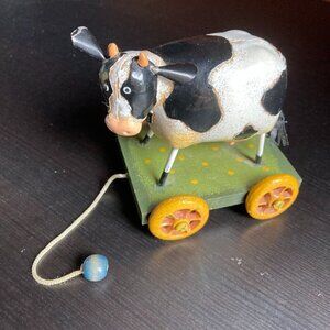 Vintage METAL COLLECTABLE  COW ON wheels by innovation "MES AMIS" COW PULL TOY